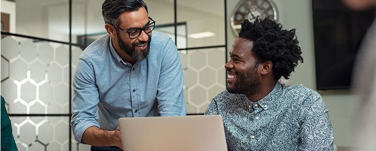 Men working on laptop