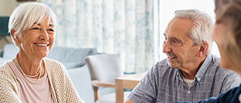 Older couple meeting with financial professional