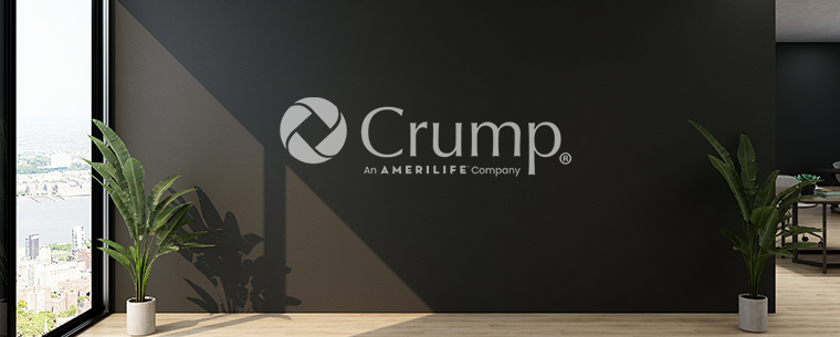 Reception area with large Crump logo on the wall