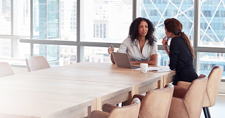 two business women in meeting