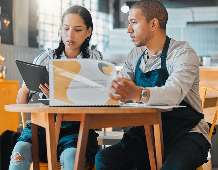 cafe store owners planning a budget