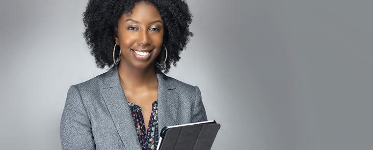 African American business woman holding an iPad