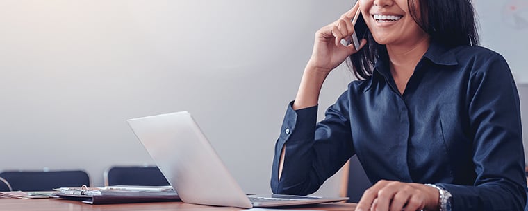 Business woman talking on a cell phone