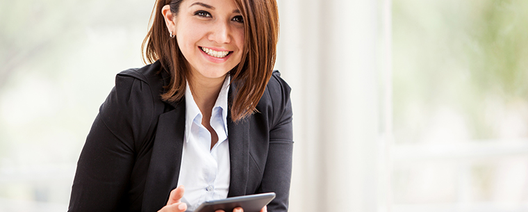 Business woman sitting and smiling